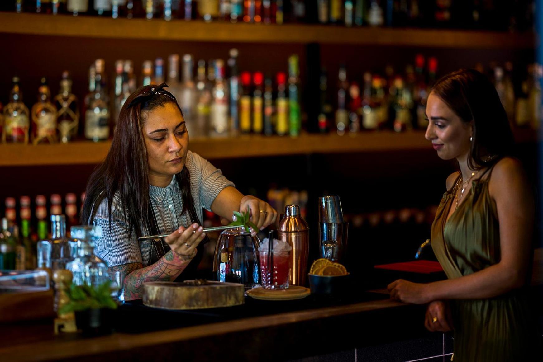 Octant Ponta Delgada Hotel Bagian luar foto A bartender at work