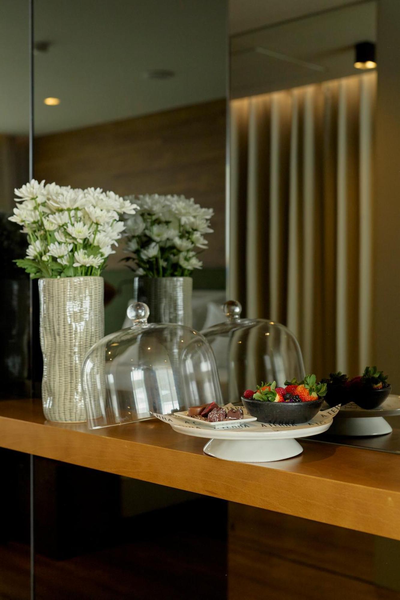 Octant Ponta Delgada Hotel Bagian luar foto A cake stand with a glass dome